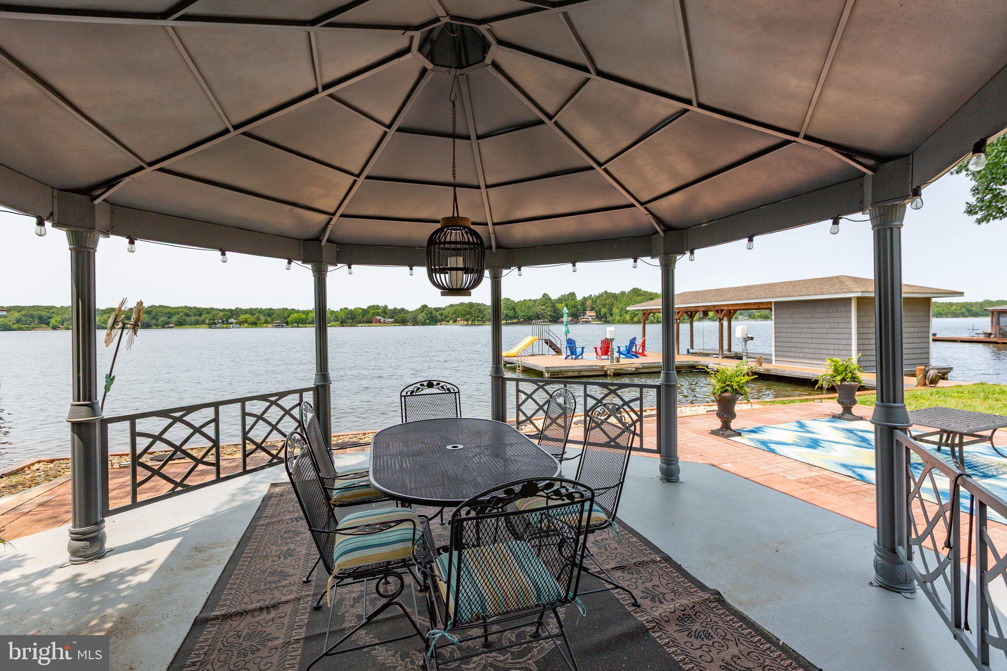 565 Busbees Point Road Bumpass, VA 23024 - Photo 84 of 135 Play area with patio and gazebo