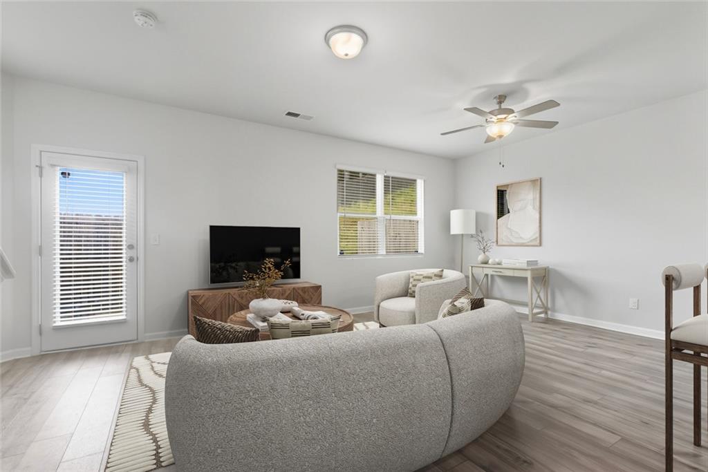 3570 Saratoga Circle Decatur, GA 30034 - Photo 9 of 26 a living room with furniture and a flat screen tv