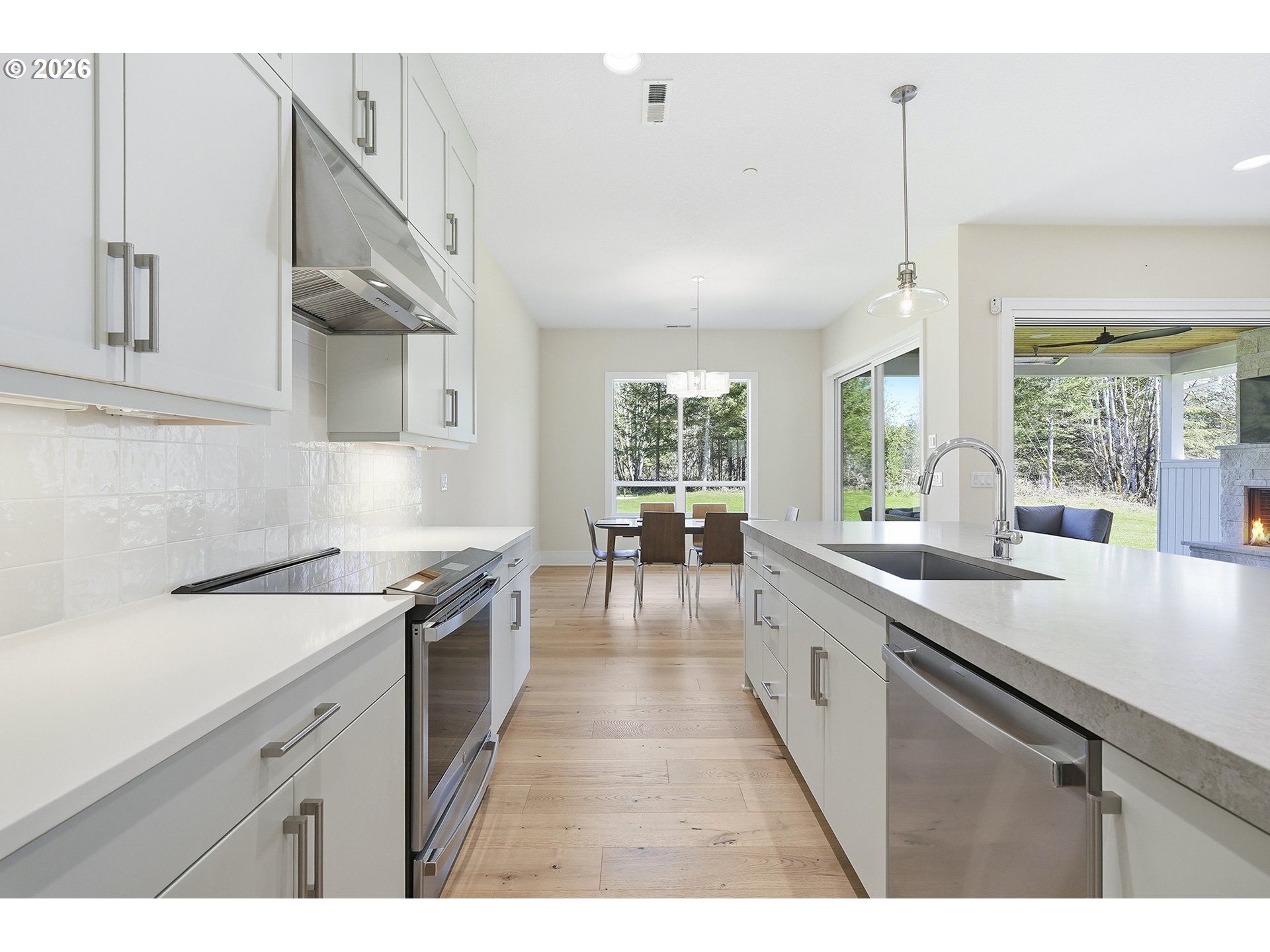 18771 Northwest Collins Road North Plains, OR 97133 - Photo 15 of 48 a kitchen with a sink and large window