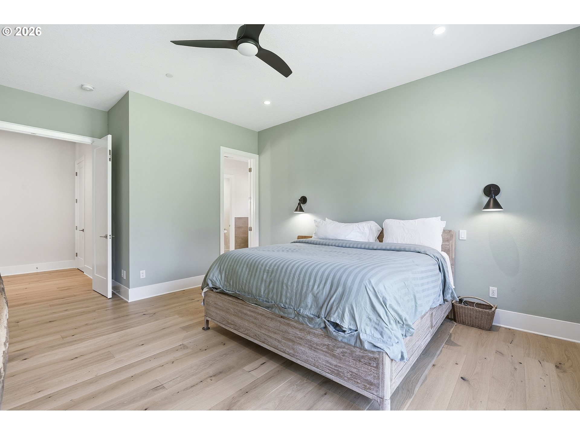 18771 Northwest Collins Road North Plains, OR 97133 - Photo 23 of 48 a bedroom with a bed and wooden floor