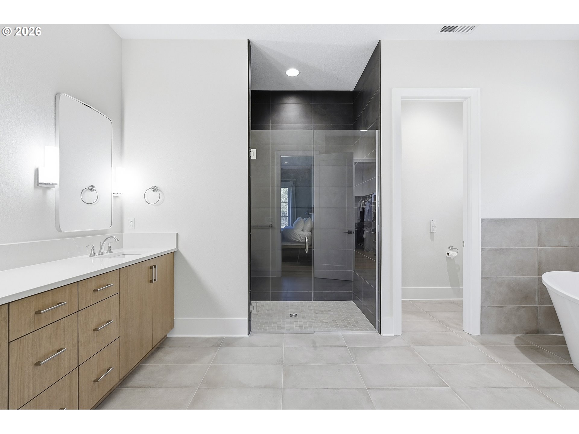 18771 Northwest Collins Road North Plains, OR 97133 - Photo 24 of 48 a bathroom with a sink and a mirror