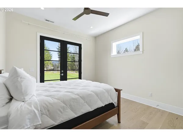 a utility room with sink dryer and washer