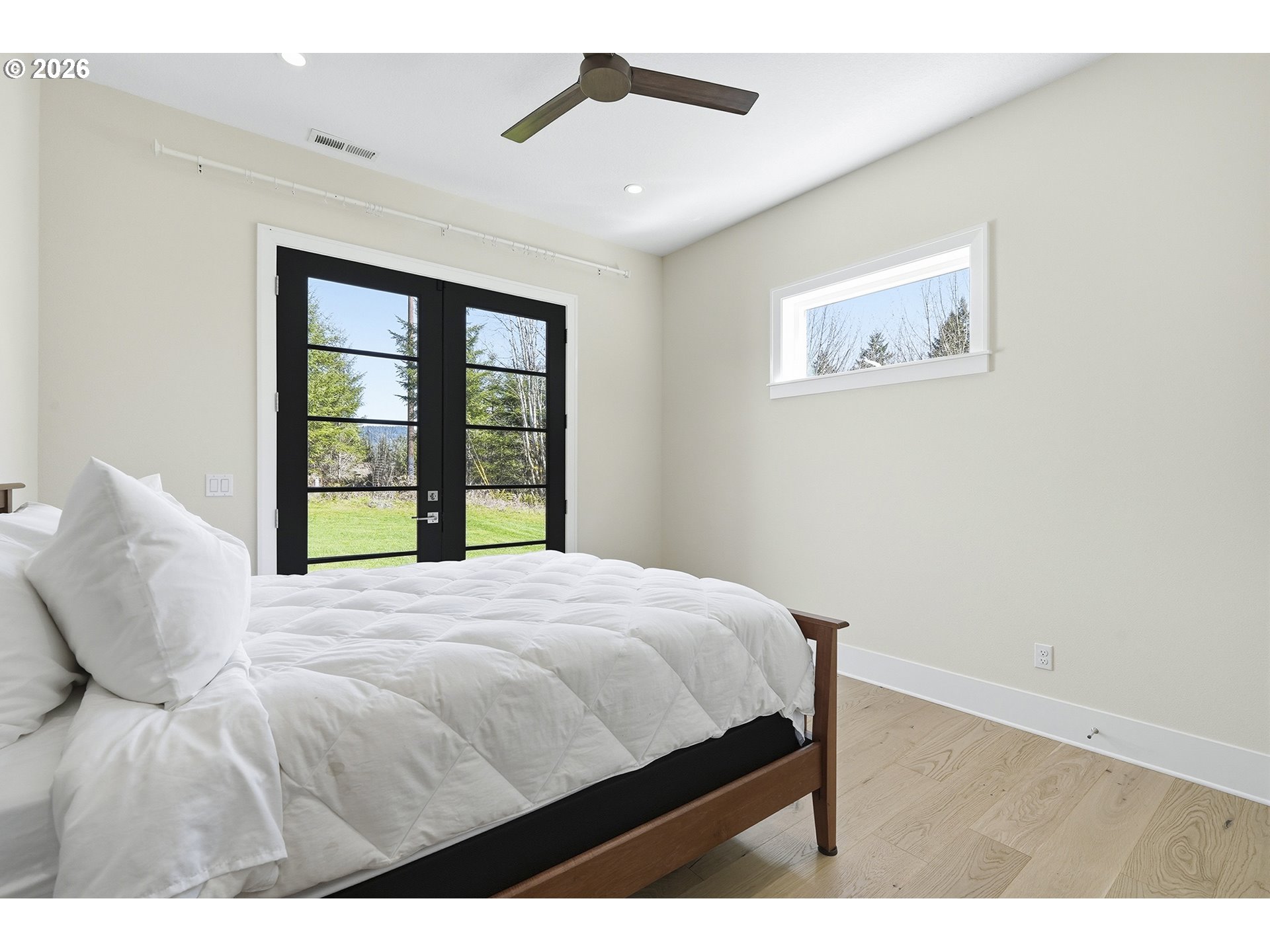 18771 Northwest Collins Road North Plains, OR 97133 - Photo 34 of 48 a bedroom with a bed and a window