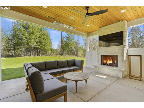 a outdoor living space with furniture and garden view