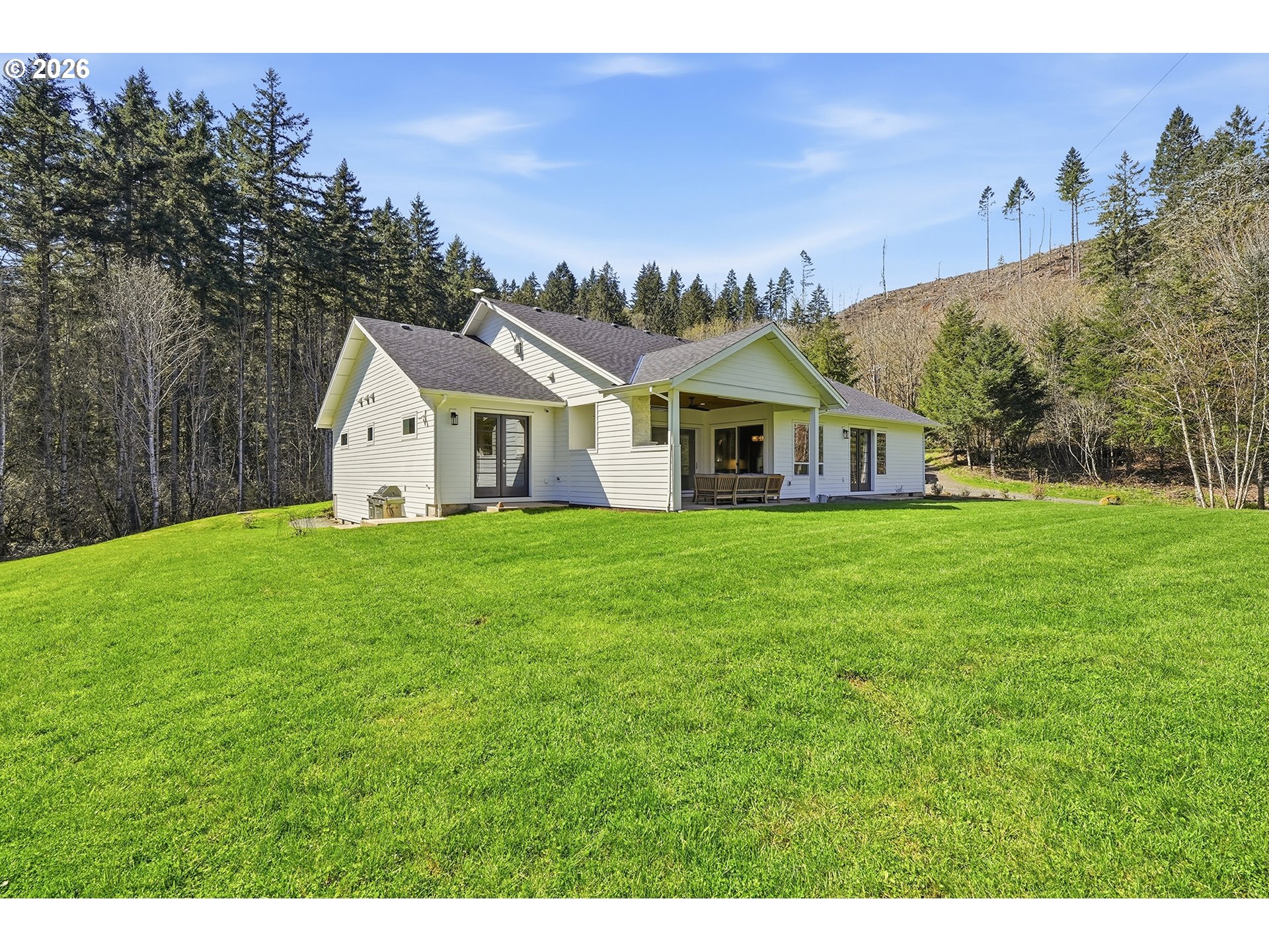 18771 Northwest Collins Road North Plains, OR 97133 - Photo 40 of 48 a view of house that has a yard