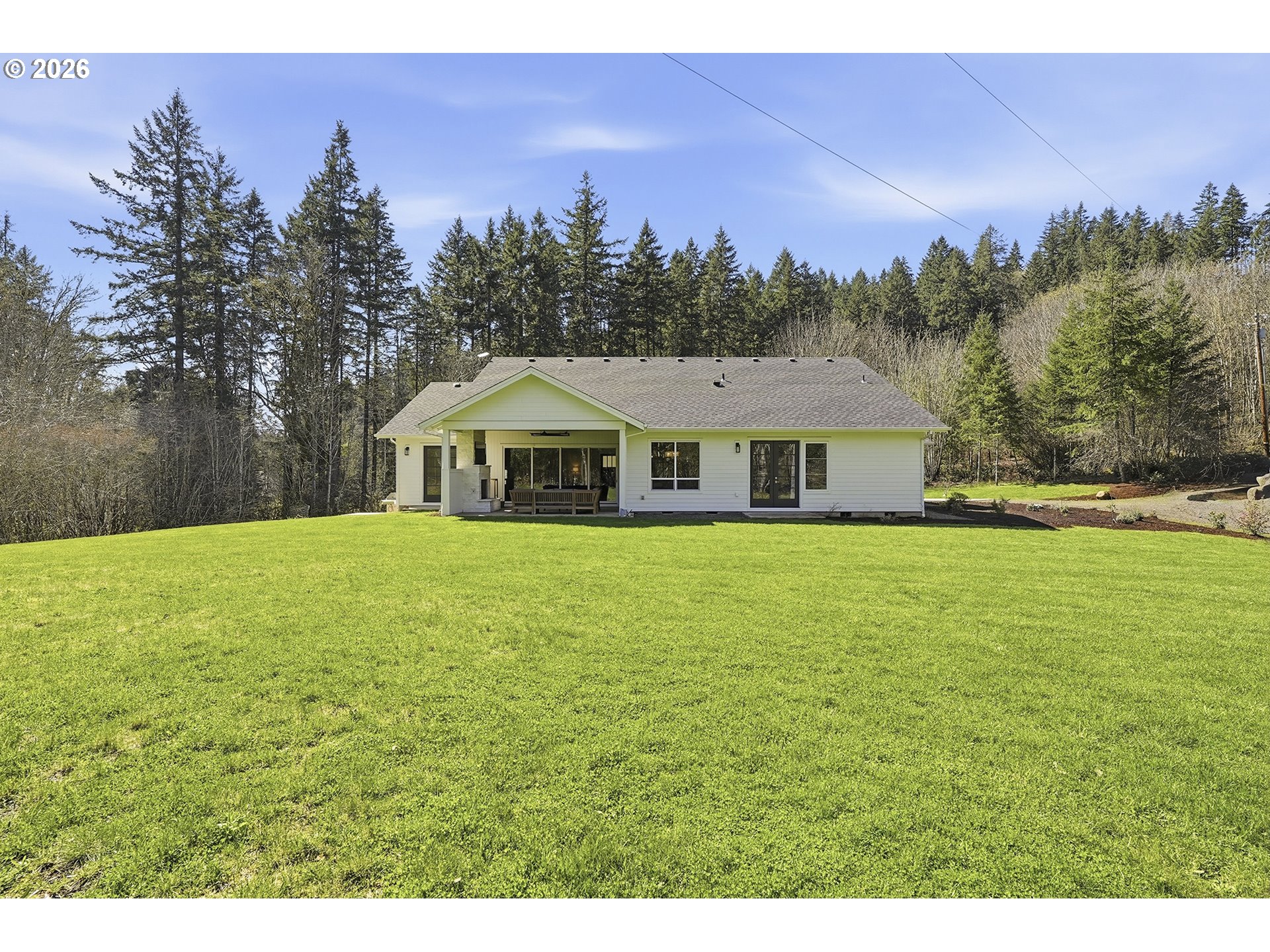 18771 Northwest Collins Road North Plains, OR 97133 - Photo 42 of 48 a front view of a house with a yard