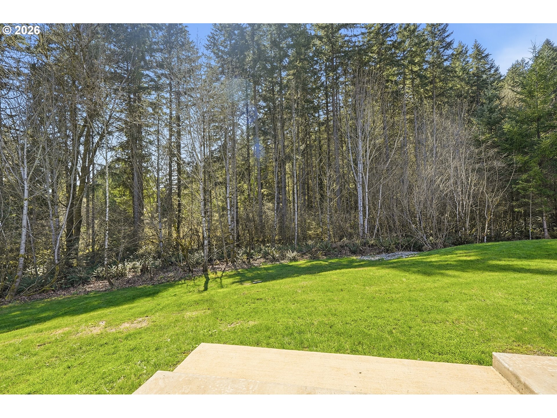 18771 Northwest Collins Road North Plains, OR 97133 - Photo 44 of 48 a backyard of a house with lots of green space