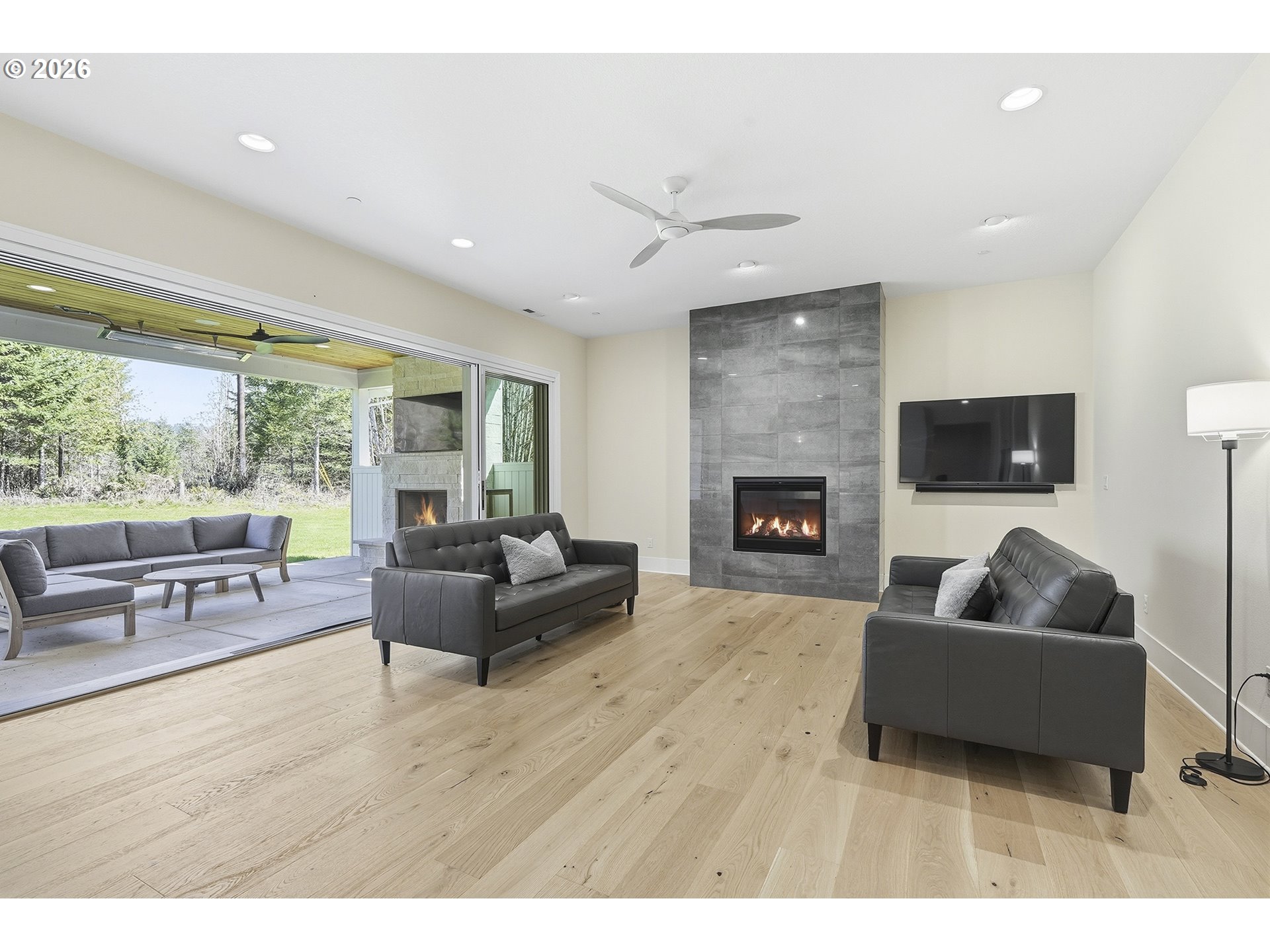 18771 Northwest Collins Road North Plains, OR 97133 - Photo 7 of 48 a living room with furniture and a fireplace