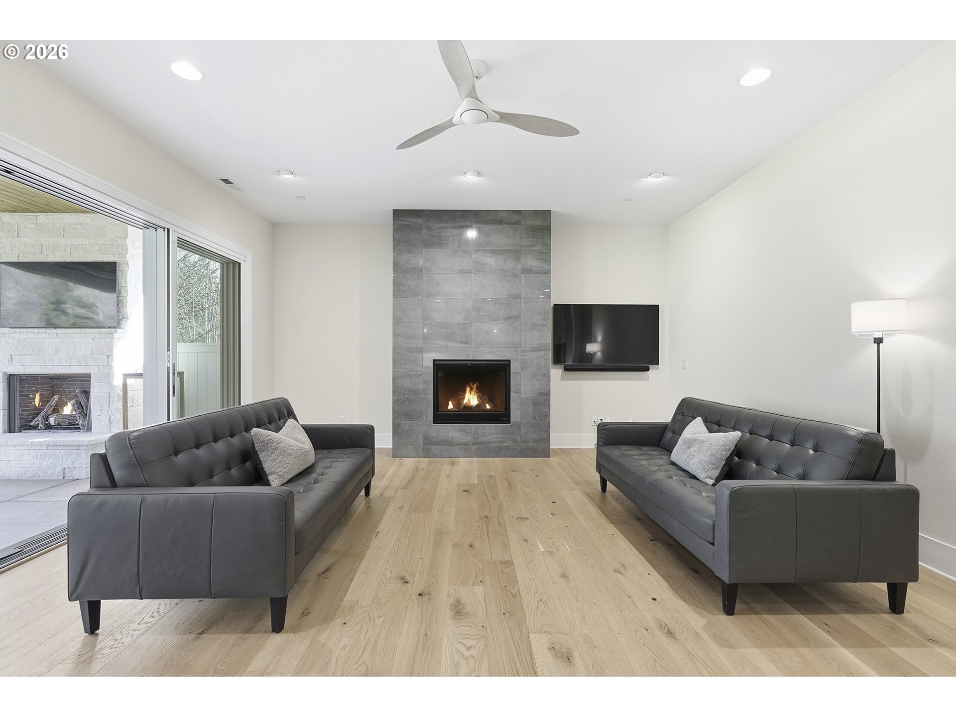 18771 Northwest Collins Road North Plains, OR 97133 - Photo 8 of 48 a living room with furniture and a fireplace