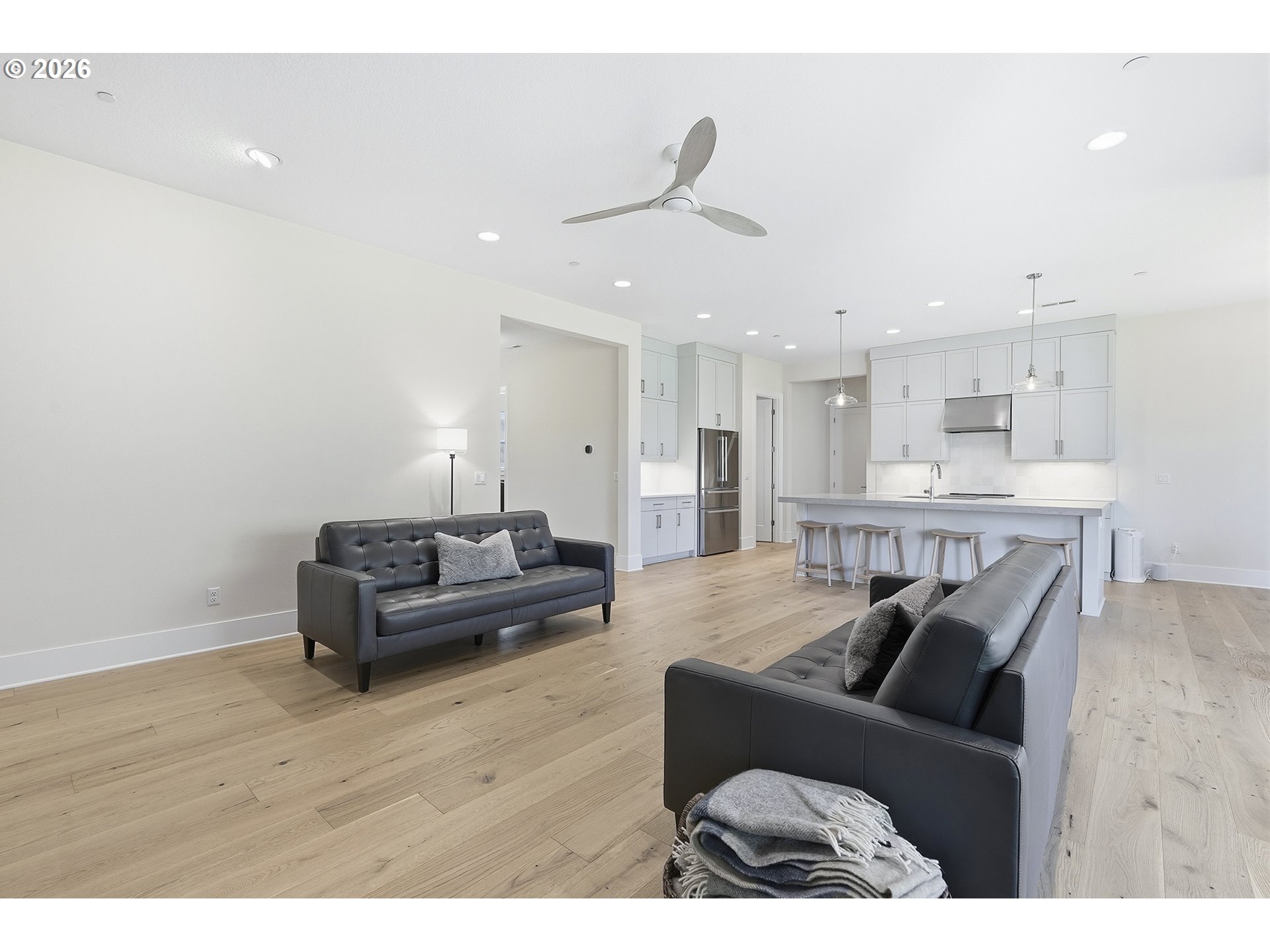18771 Northwest Collins Road North Plains, OR 97133 - Photo 9 of 48 a living room with furniture and a wooden floor