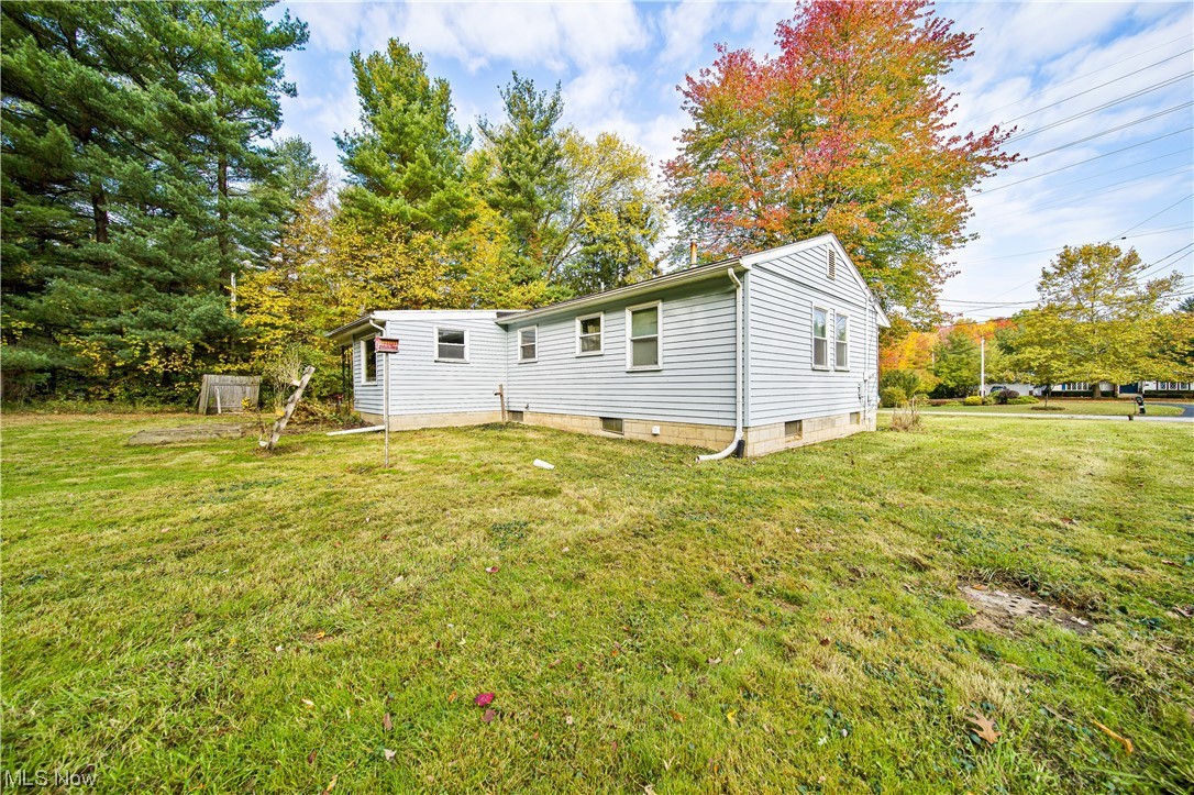 1168 Garrison Road Ashtabula, OH 44004 - Photo 12 of 35 Back of house with a yard