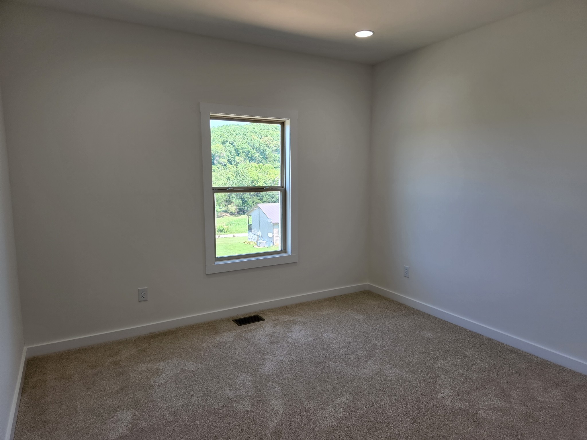 62 Shoulders Road Dixon Springs, TN 37057 - Photo 13 of 22 an empty room with a window