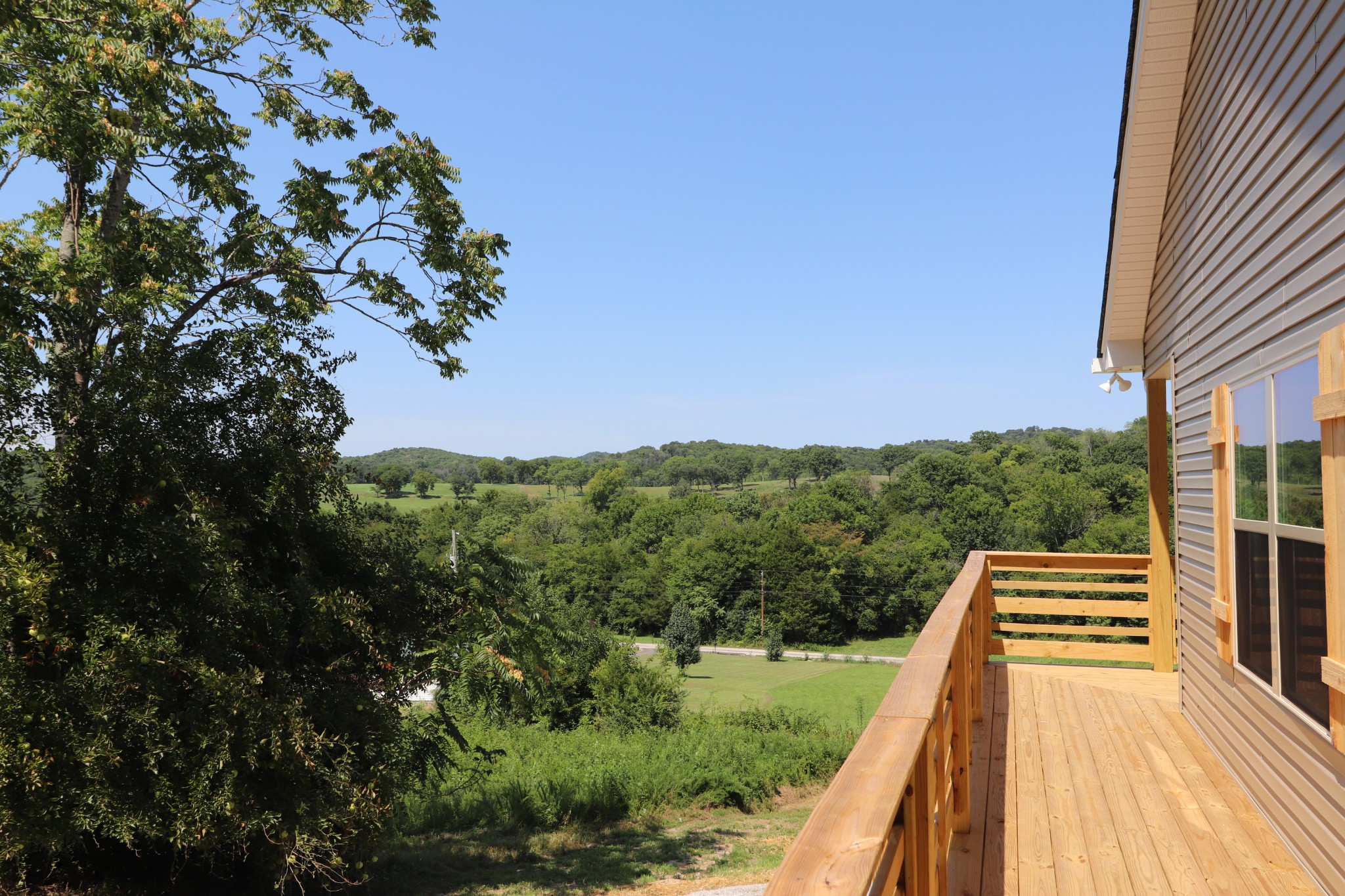 62 Shoulders Road Dixon Springs, TN 37057 - Photo 18 of 22 a view of a balcony with an outdoor space