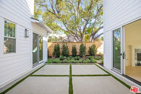 a view of a porch with a yard