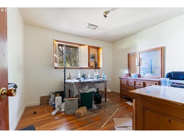 a kitchen with a sink and a refrigerator