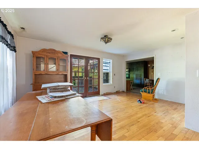 a bedroom with furniture and window