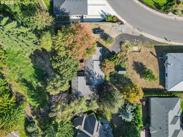 an aerial view of houses with yard