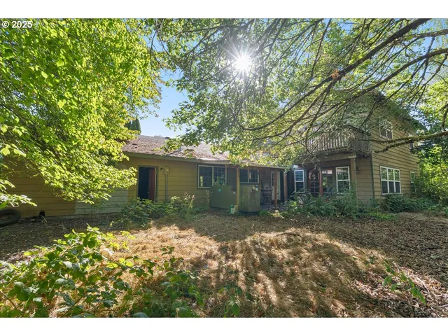 a backyard of a house with seating space