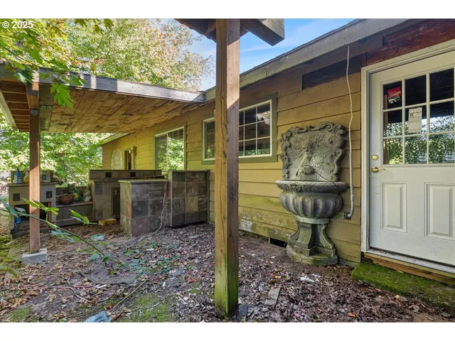 a view of house outdoor space and garden
