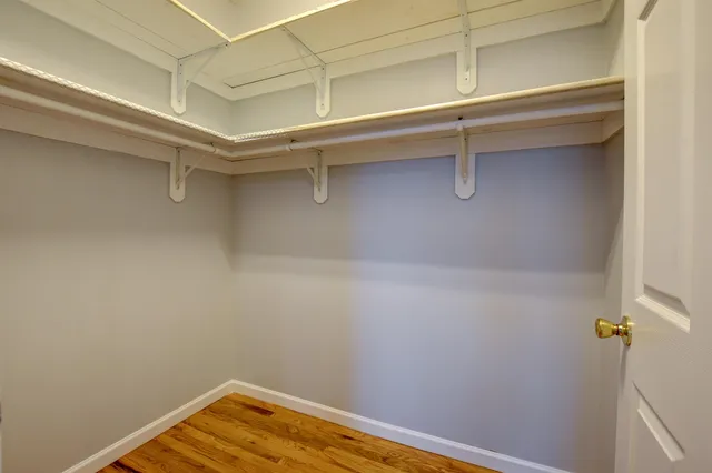 a view of a room with racks on the wall