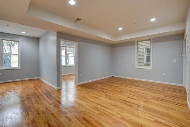 a view of an empty room and window