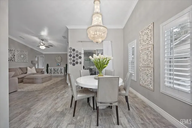 a kitchen with stainless steel appliances granite countertop a refrigerator stove a sink and microwave