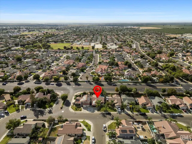 an aerial view of city and lake