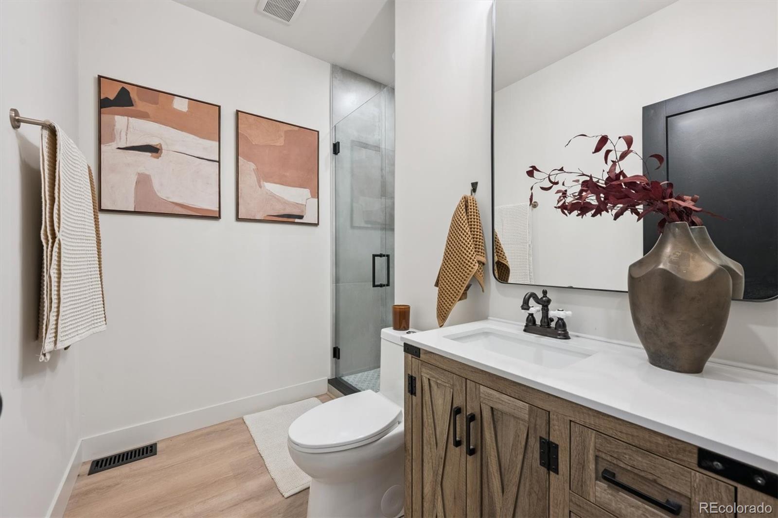 16170 Mt Vernon Road Golden, CO 80401 - Photo 12 of 44 a bathroom with a sink and a mirror