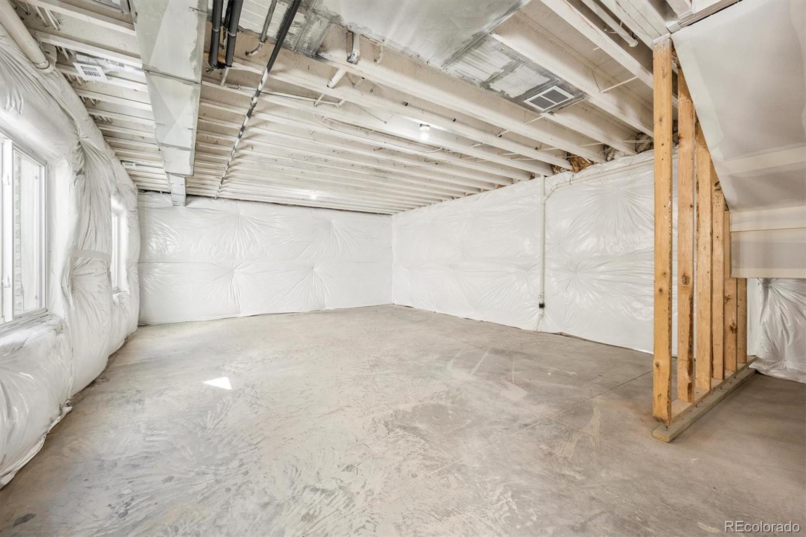 16170 Mt Vernon Road Golden, CO 80401 - Photo 31 of 44 a view of a room with racks on the wall