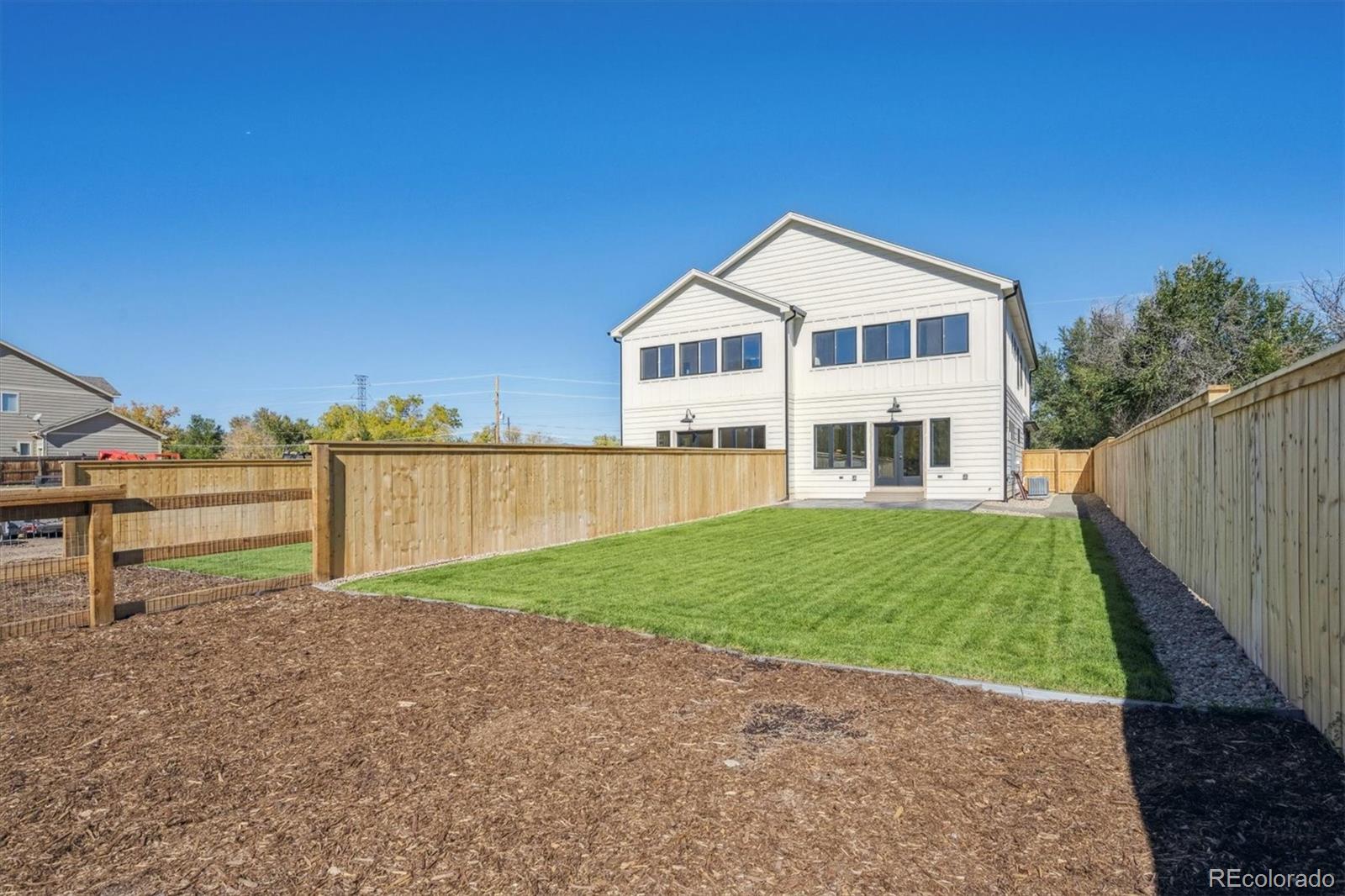 16170 Mt Vernon Road Golden, CO 80401 - Photo 33 of 44 a house view with a garden space
