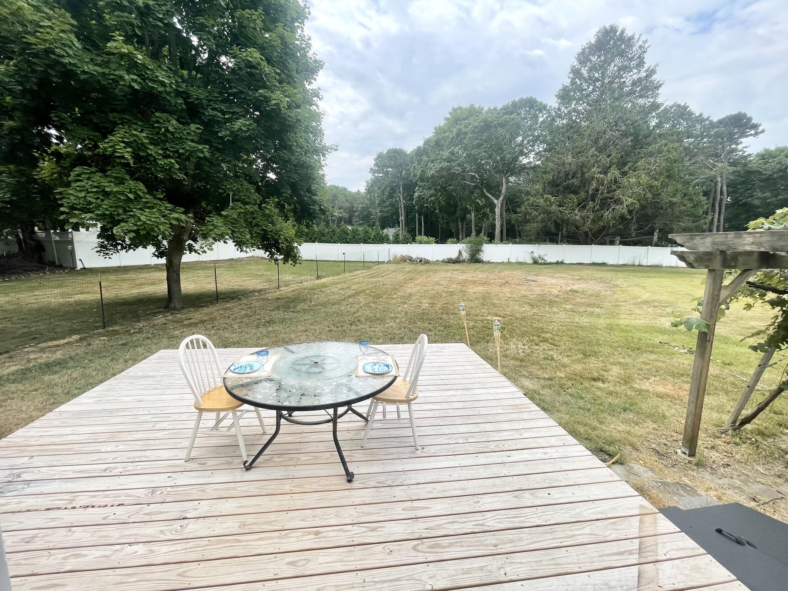 740 Sandwich Road Bourne, MA 02532 - Photo 20 of 50 back deck off kitchen.yard