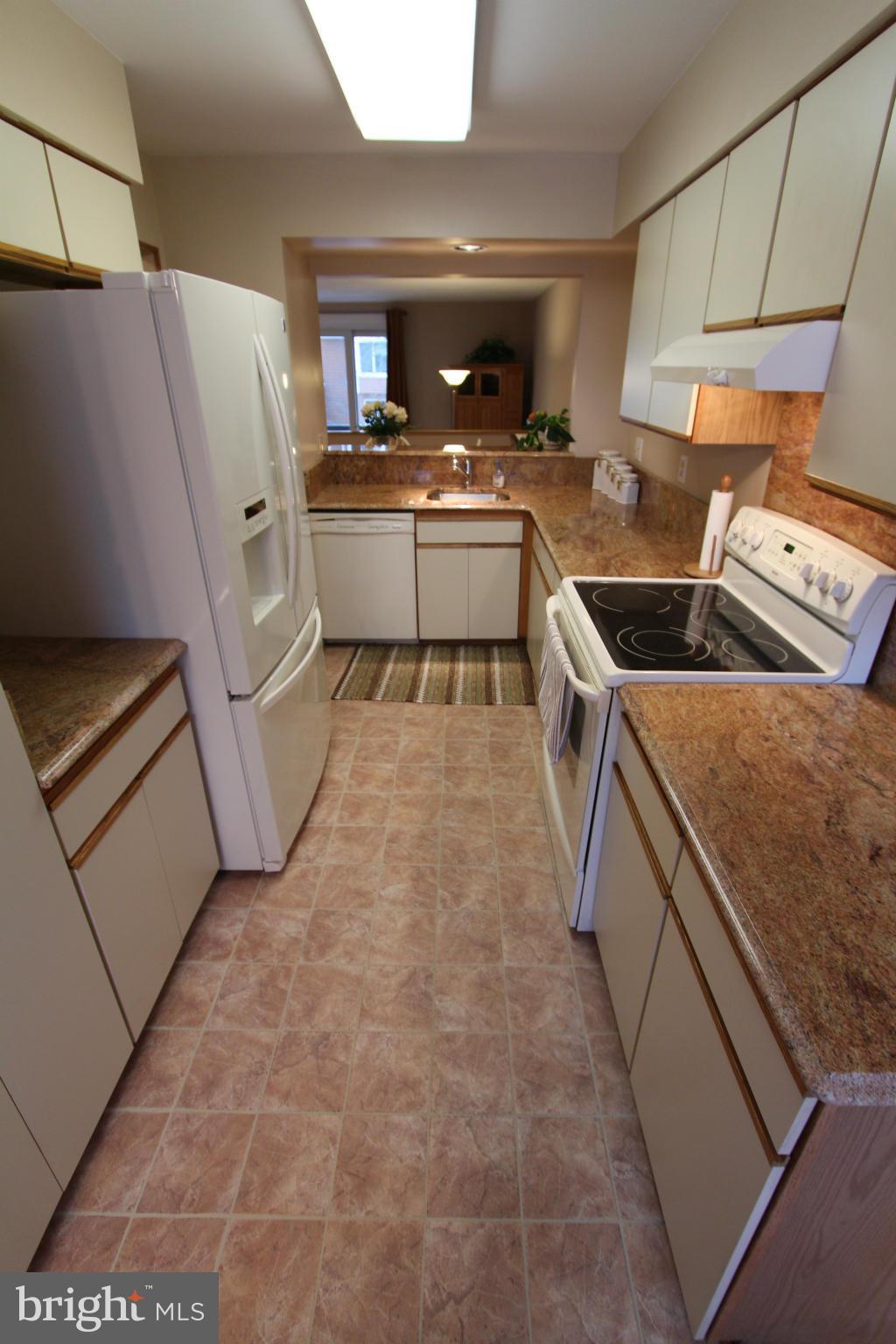 5215 Columbia Road, Unit 660 Columbia, MD 21044 - Photo 2 of 29 Kitchen - new granite counters - tile floor