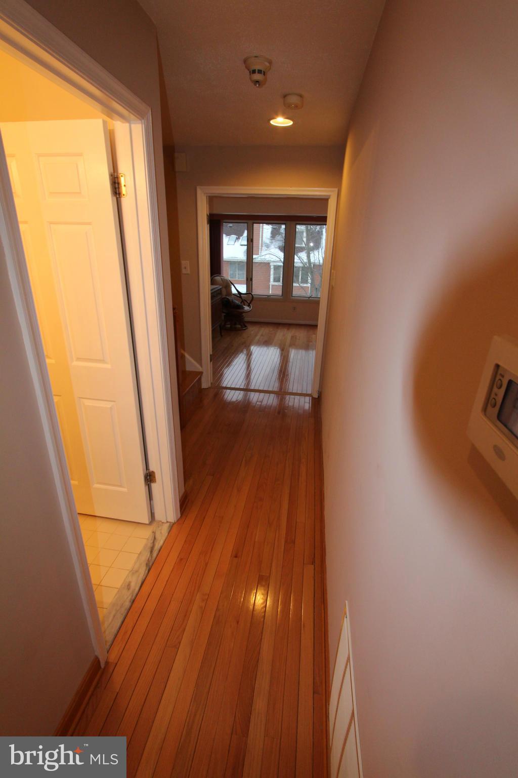 5215 Columbia Road, Unit 660 Columbia, MD 21044 - Photo 18 of 29 Hallway - 2nd level - hardwood