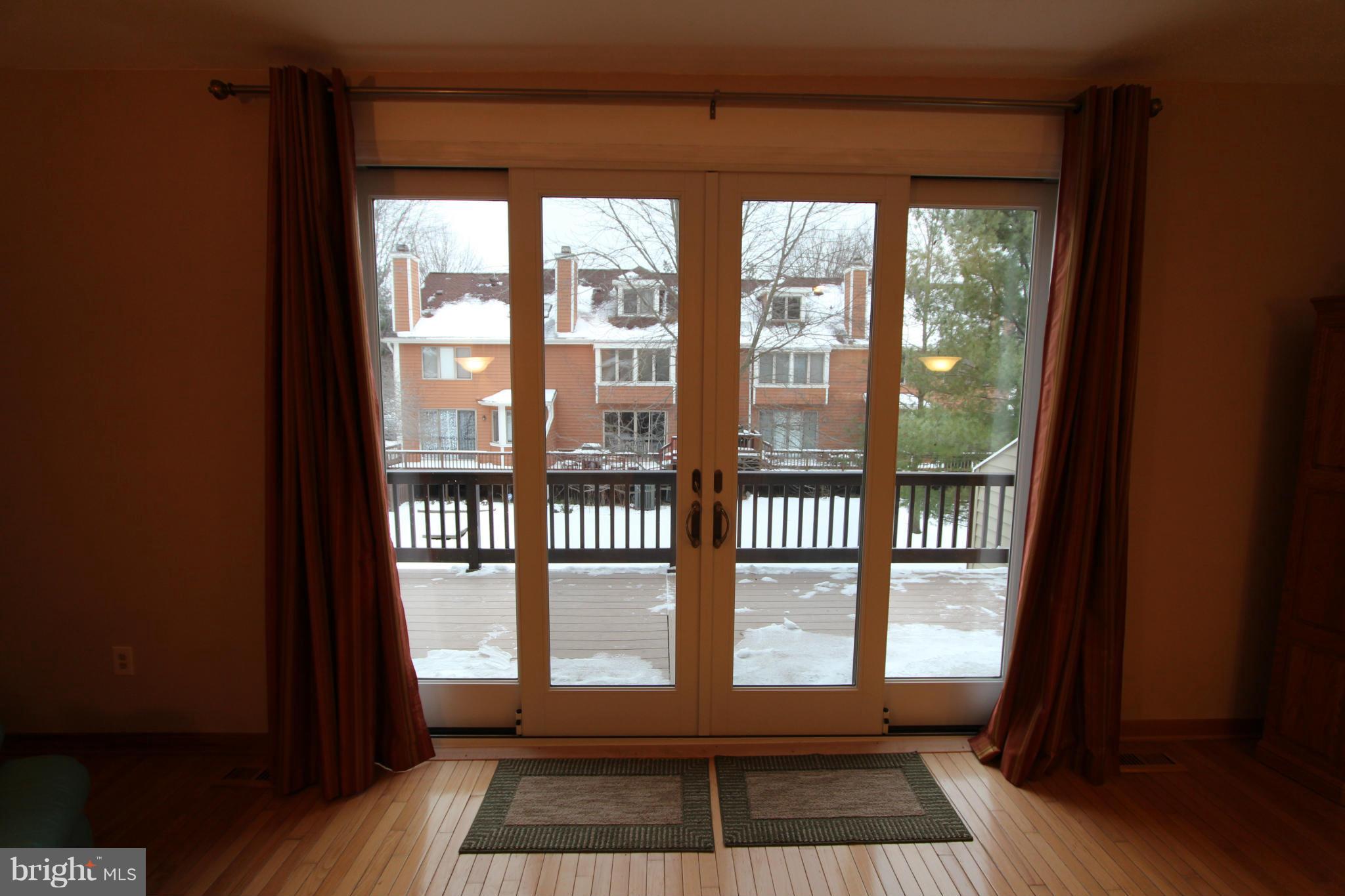 5215 Columbia Road, Unit 660 Columbia, MD 21044 - Photo 10 of 29 New sliding glass door leading to new Azek deck