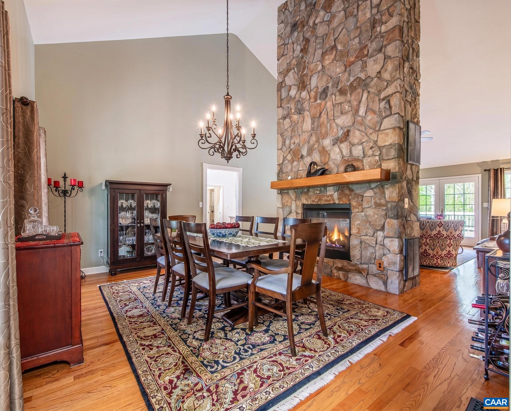 1089 Broken Island Road Palmyra, VA 22963 - Photo 18 of 74 a view of a dining room with furniture a chandelier and wooden floor