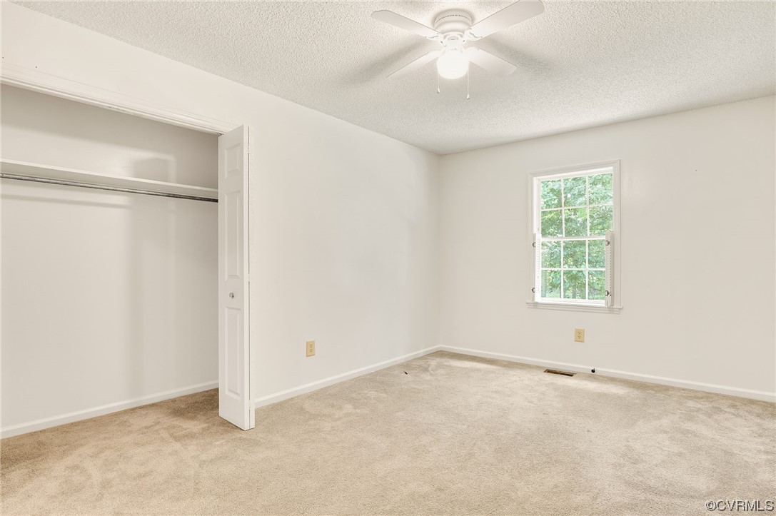 5158 Boydton Plank Road Brodnax, VA 23920 - Photo 23 of 43 a view of an empty room with a window