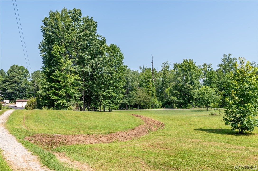 5158 Boydton Plank Road Brodnax, VA 23920 - Photo 28 of 43 a view of a swimming pool with a yard