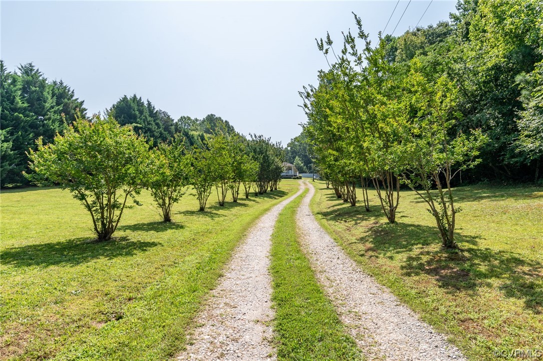 5158 Boydton Plank Road Brodnax, VA 23920 - Photo 30 of 43 a view of a lake with a garden