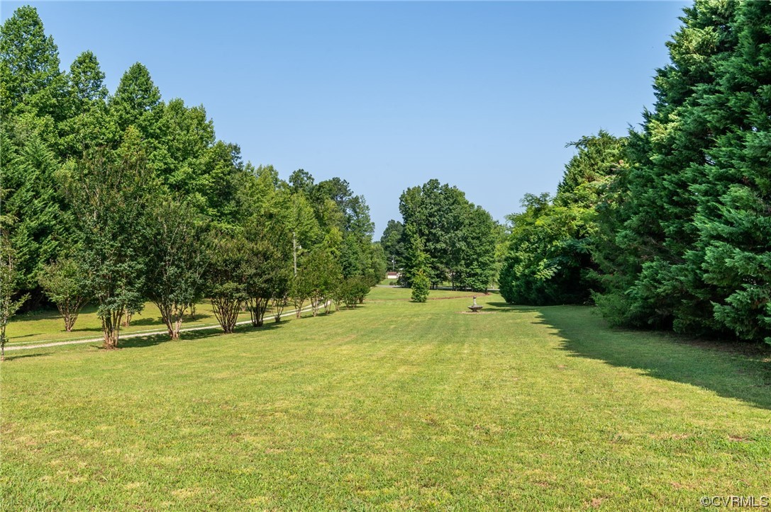 5158 Boydton Plank Road Brodnax, VA 23920 - Photo 31 of 43 a swimming pool with an outdoor space and seating area