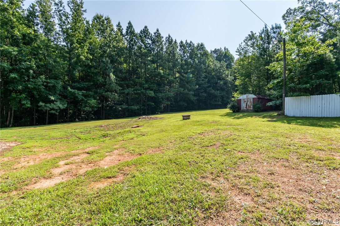 5158 Boydton Plank Road Brodnax, VA 23920 - Photo 32 of 43 a swimming pool with trees in the background