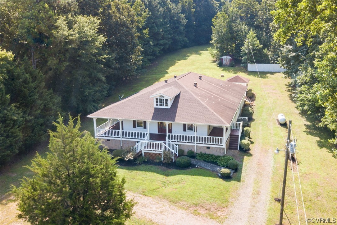 5158 Boydton Plank Road Brodnax, VA 23920 - Photo 40 of 43 an aerial view of a house with swimming pool and large trees