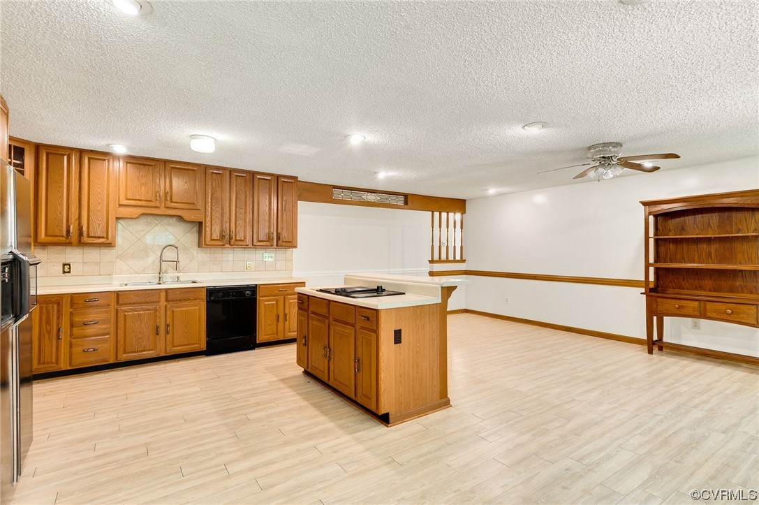 5158 Boydton Plank Road Brodnax, VA 23920 - Photo 7 of 43 a kitchen with stainless steel appliances granite countertop a stove a sink and a refrigerator