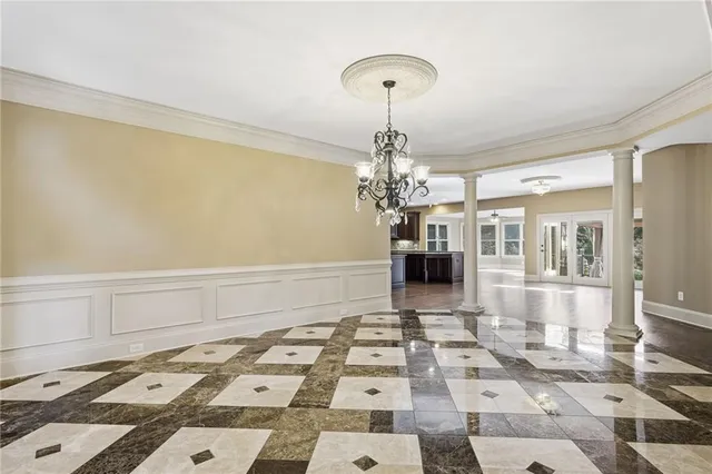 a bathroom with a granite countertop sink toilet and shower curtains