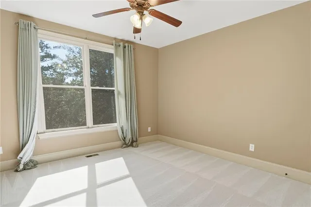 a stove top oven sitting inside of a kitchen