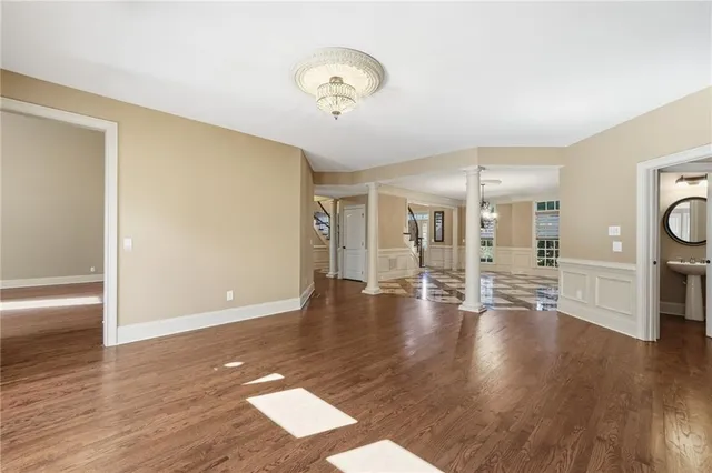 a view of a livingroom with a fireplace and window