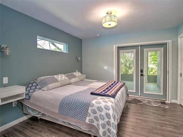 a bathroom with a double vanity sink and mirror
