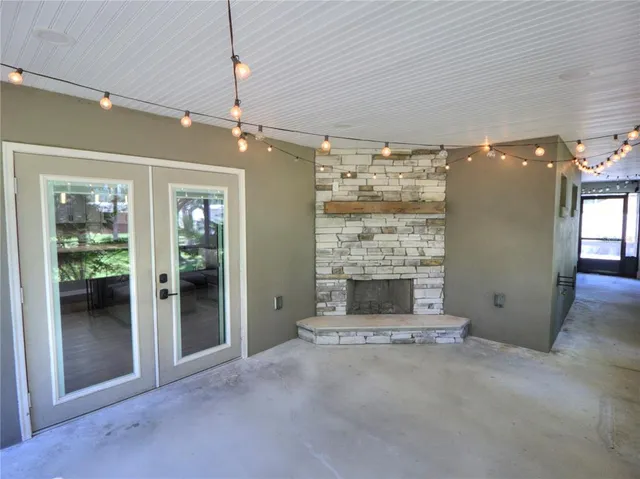 a small pool with an outdoor seating