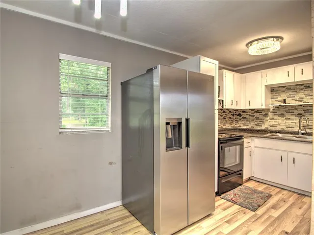 a view of yard with porch and a yard