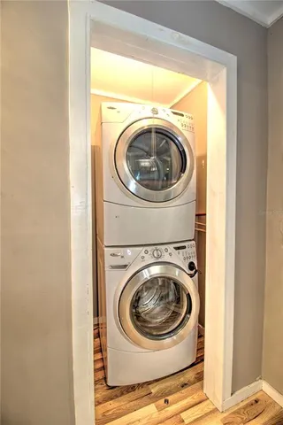 an aerial view of a house with a swimming pool