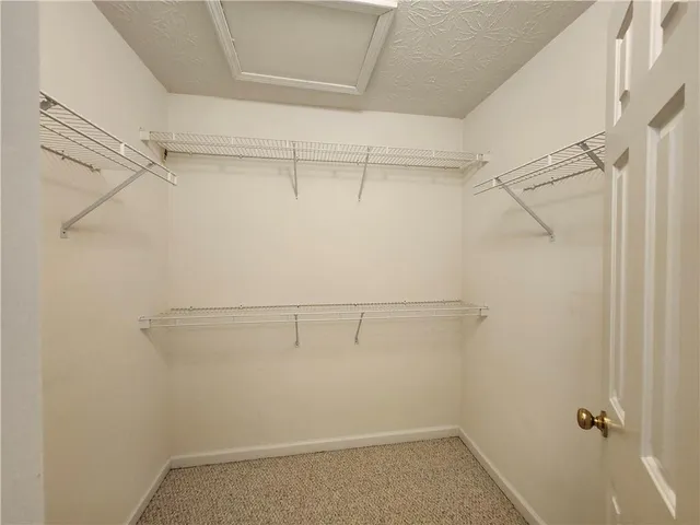 a view of a room with racks on the wall